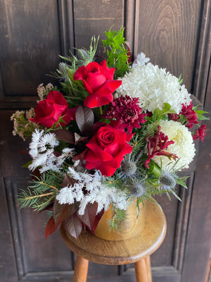 Christmas Arrangement In A Gold Pot