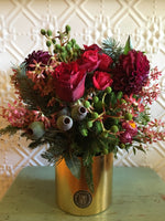 Christmas arrangement in gold pot ideal for the festive season and for you Christmas table. Rises wildflowers, Xmas bush, spruce and eucalyptus.
