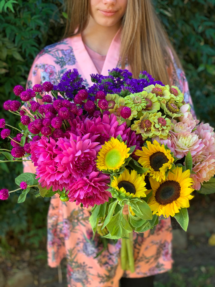 Beautiful seasonal bouquets, gift wrapped with hessian bow  The perfect gift for Mother's Day in seasonal bright tones, or for that special someone just because!  Four Size Options available:  - Standard  - Classic  - Premium  - Luxe  Colour Options available:  - Bright tones     Please note - Bouquets may vary from pictures due to seasonality of flowers.